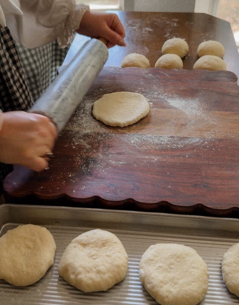 Shaping sourdough hamburger bun dough into discs