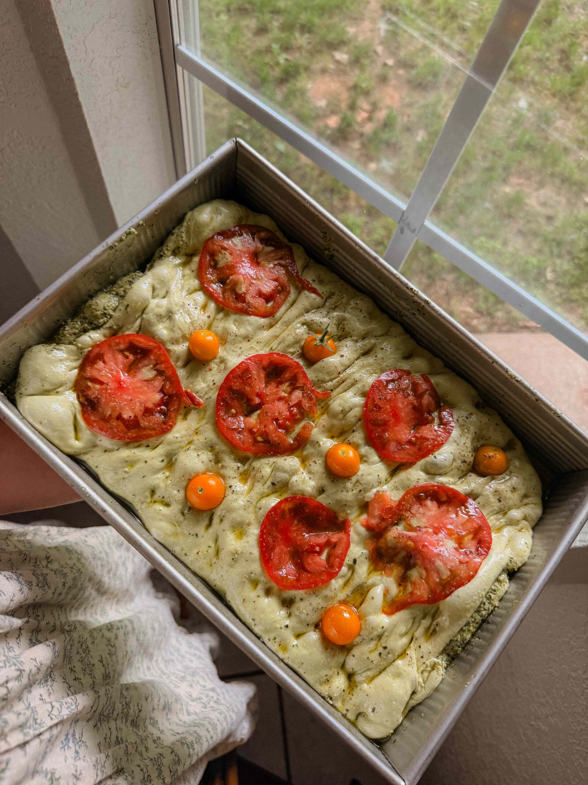 Pesto swirl sourdough focaccia fresh from the oven