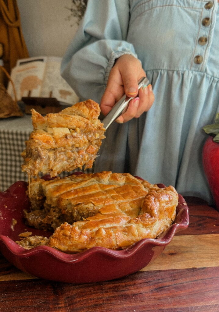 Steak and Guinness meat pie with golden puff pastry