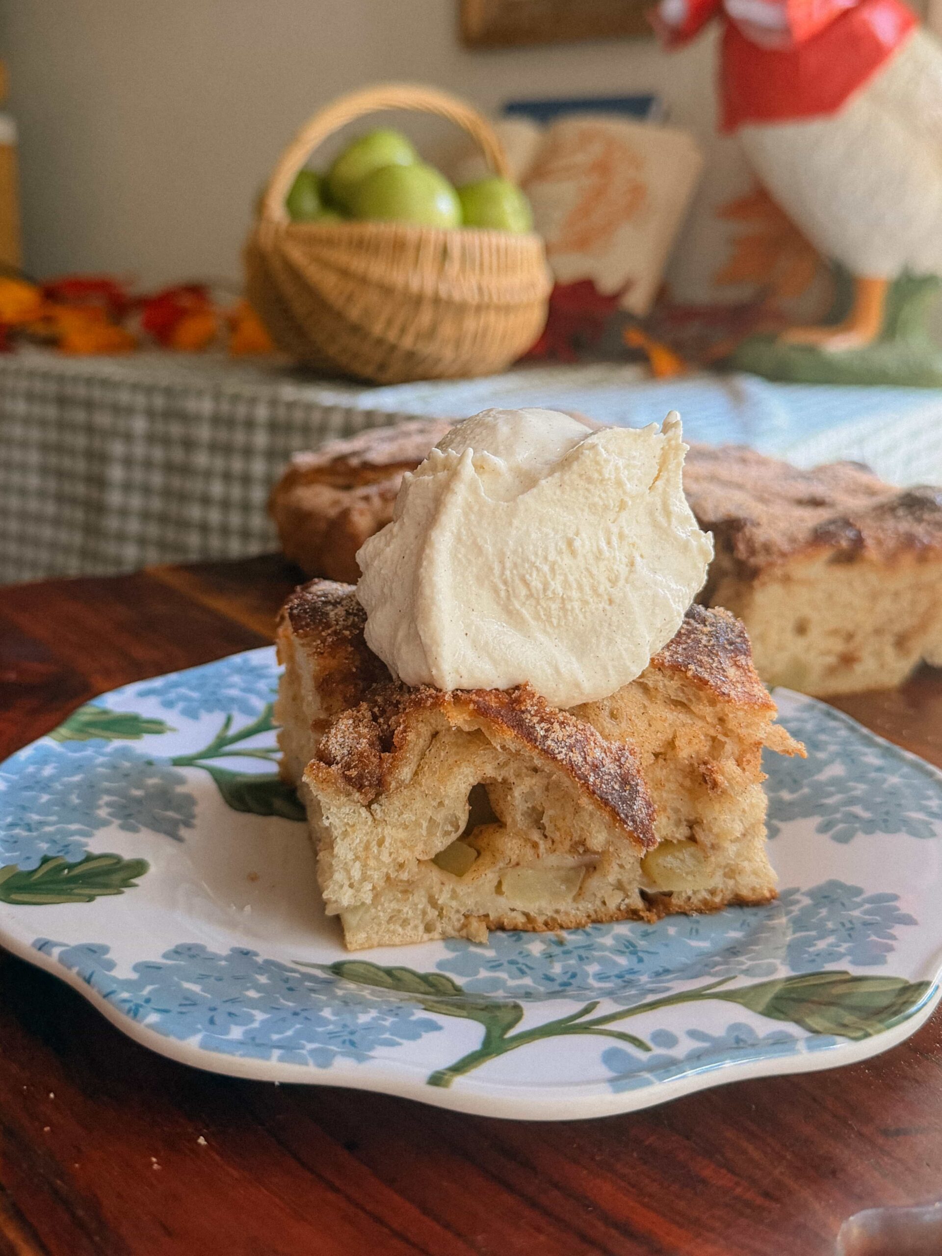 Slice of apple cider focaccia served warm with vanilla ice cream