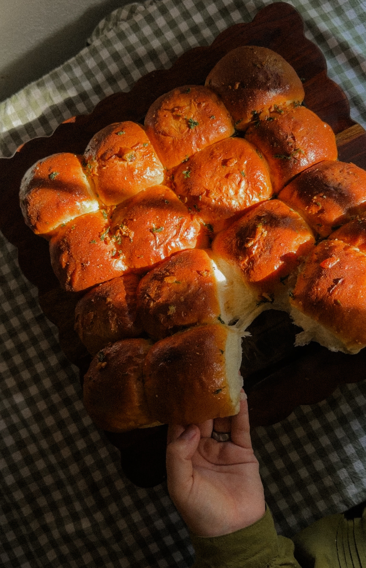 Same-day sourdough dinner rolls brushed with garlic butter